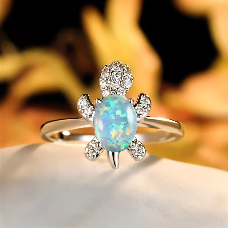 Platinum Ring With A Colored Tortoise Design Featuring Blue Diamondsunisex