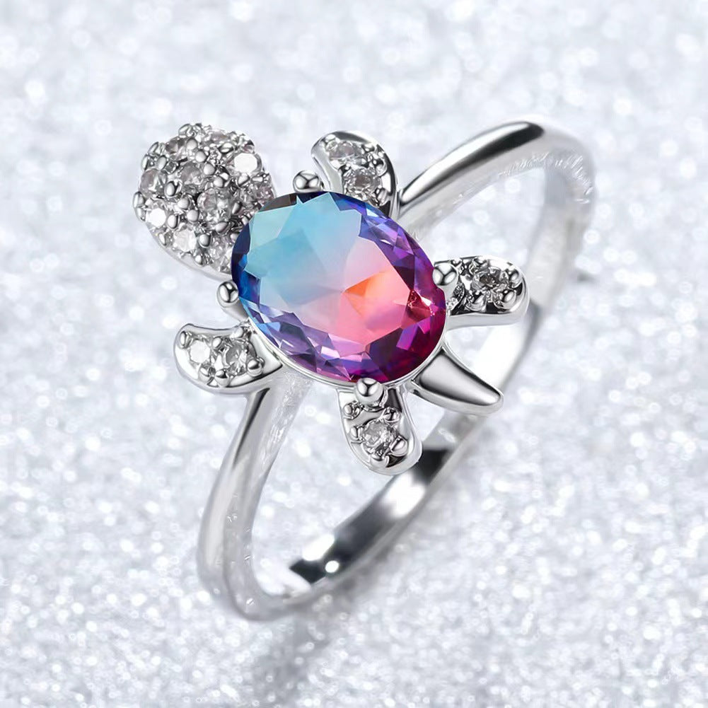 Platinum Ring With A Colored Tortoise Design Featuring Blue Diamondsunisex